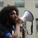 a young person talking into a megaphone