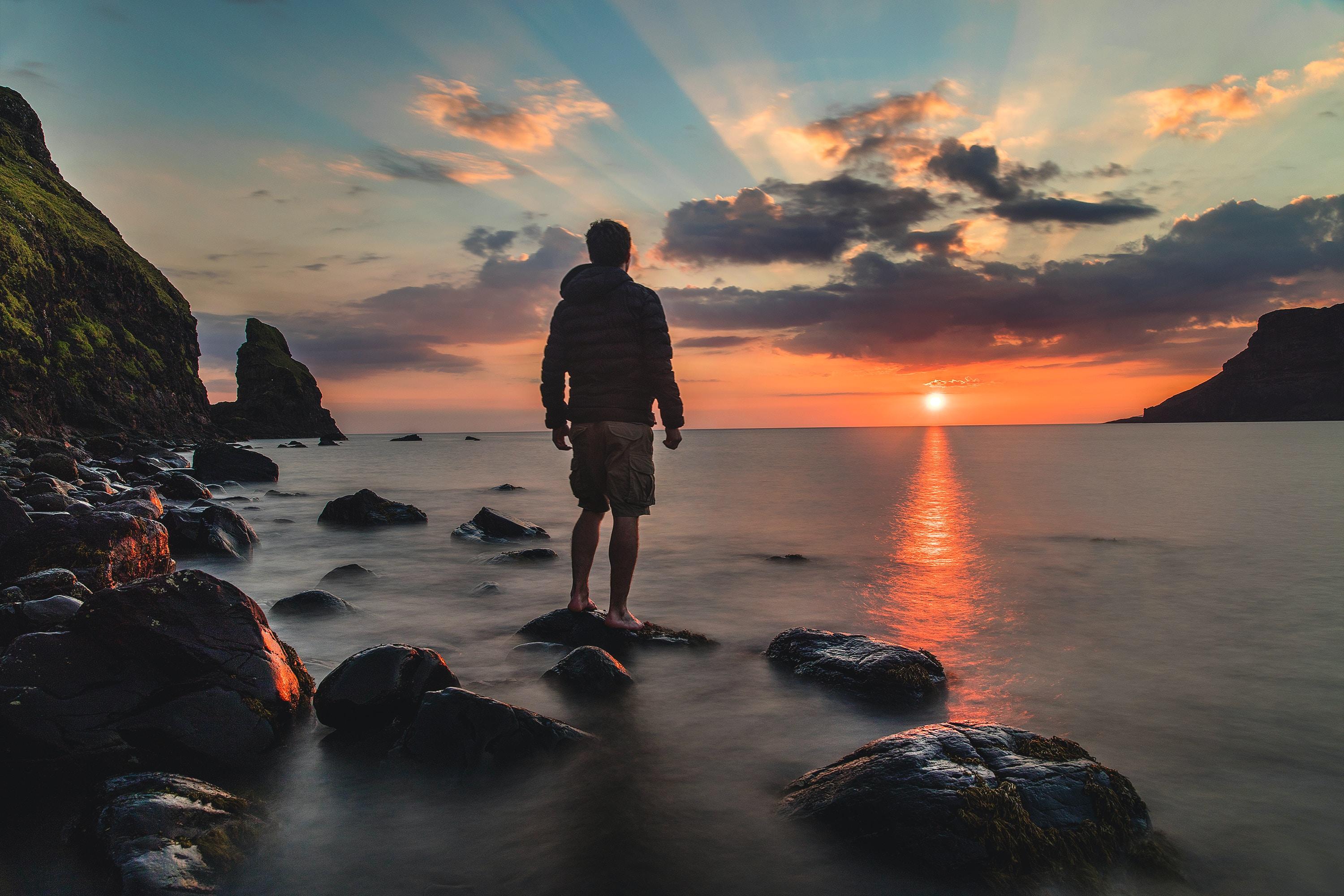 person watching the sunset