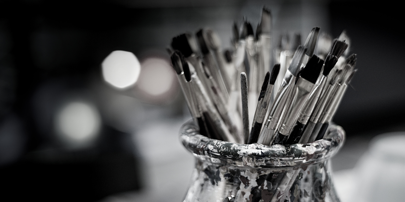 black and white photo of paint brushes