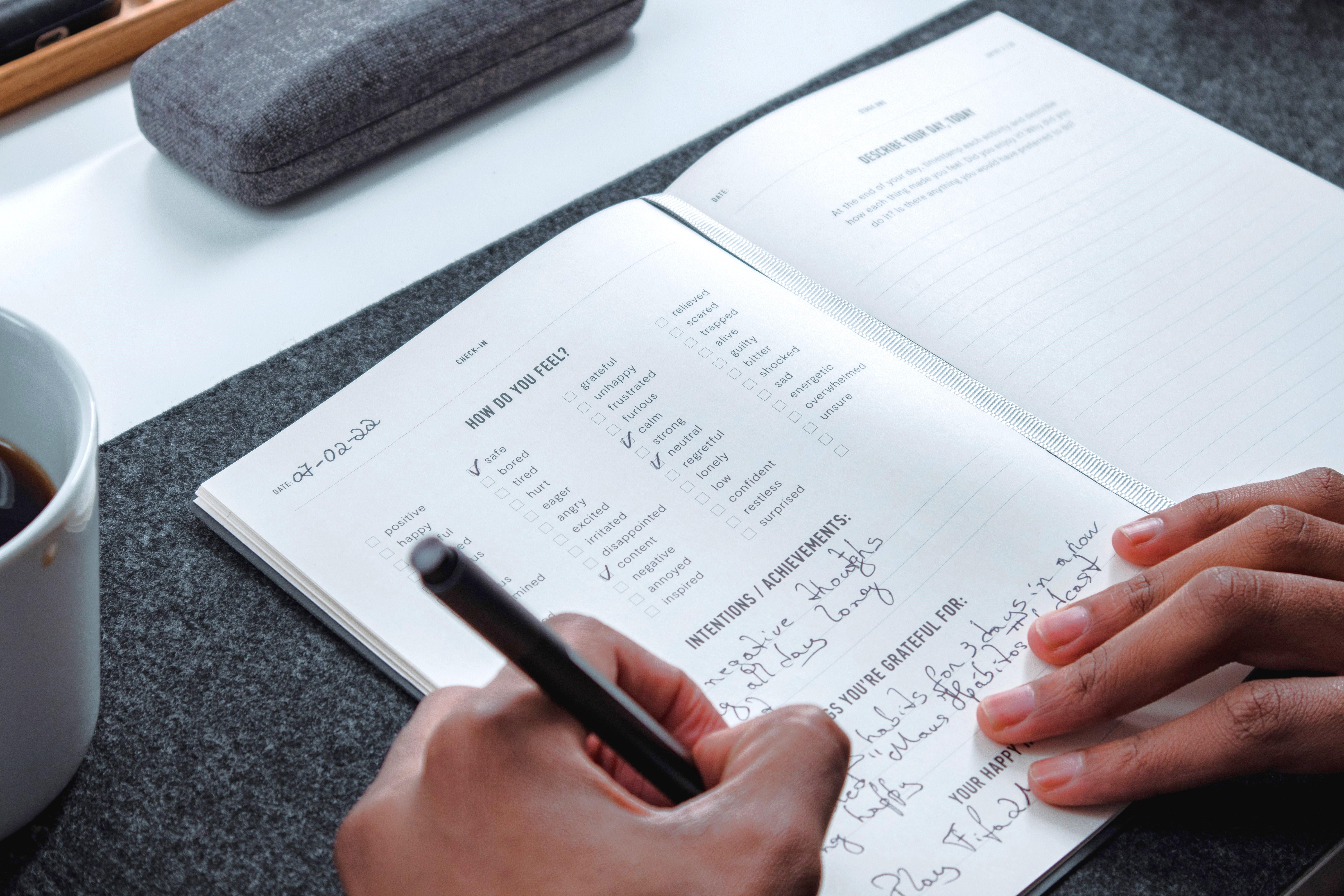Hand writing in journal