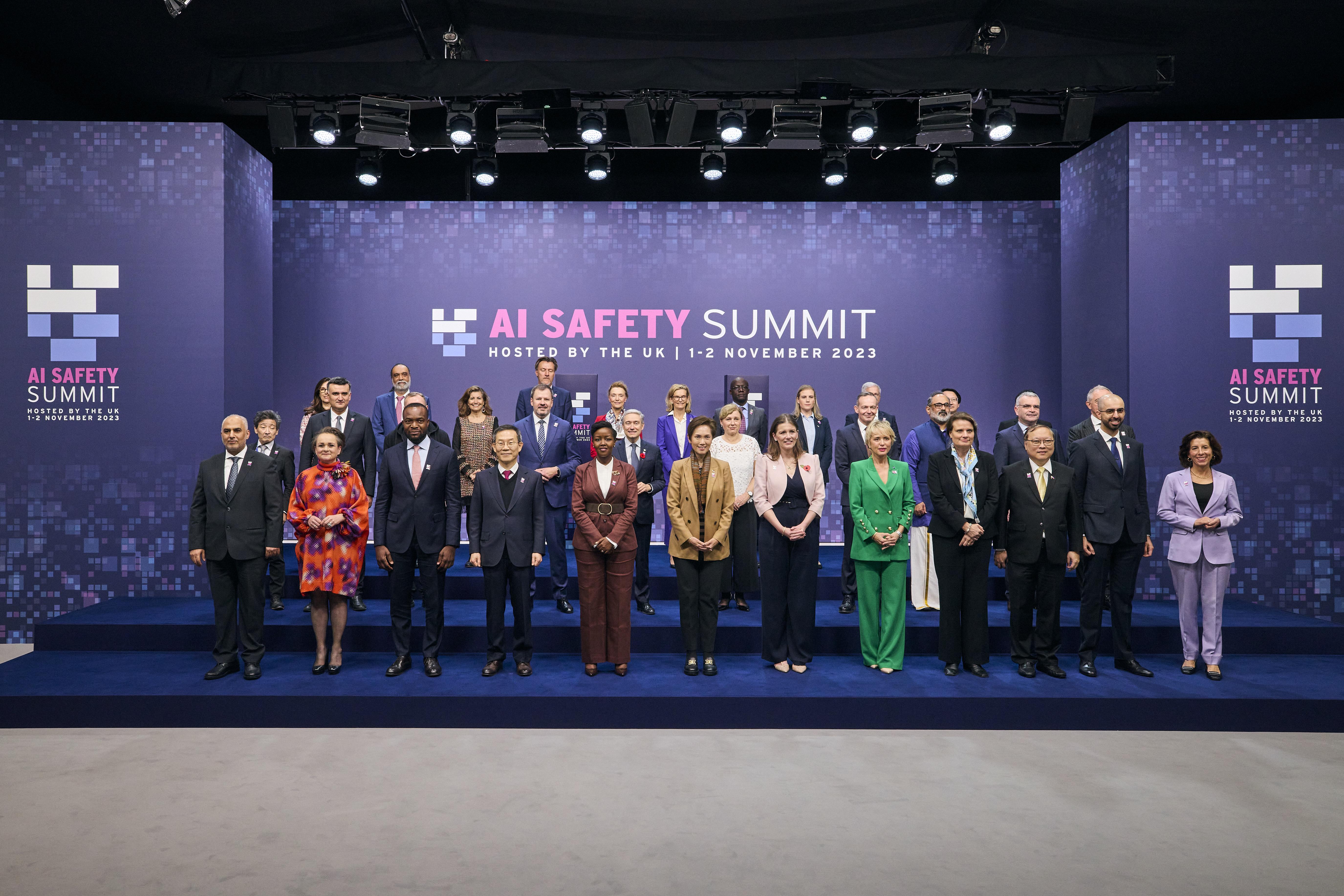AI Summit attendees standing in a row