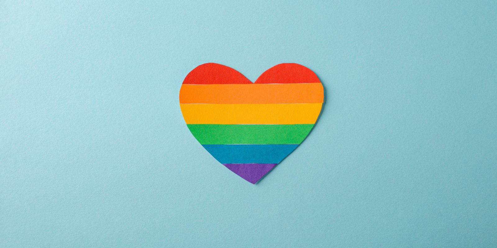 pride heart on a blue background