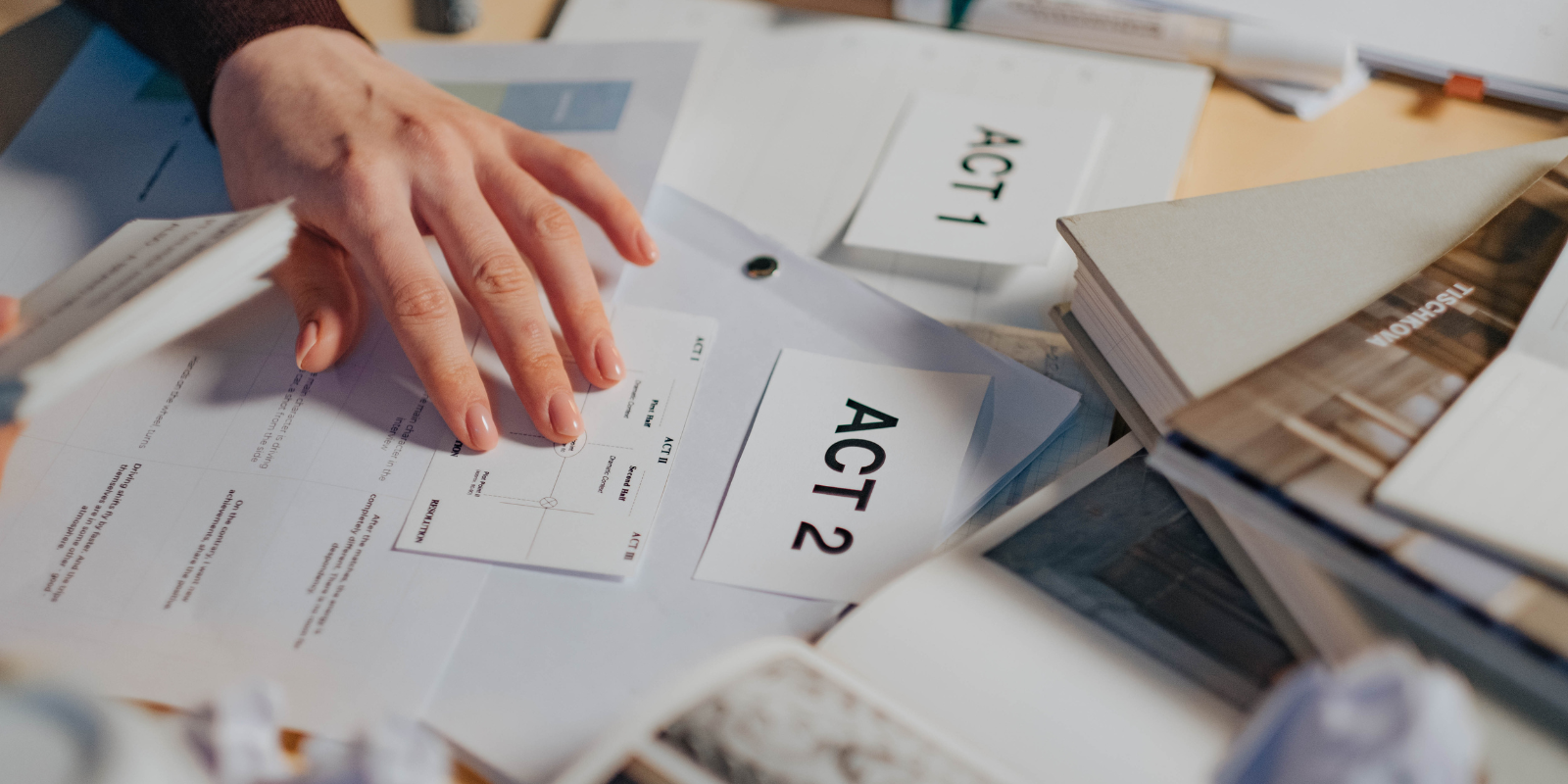 Person Holding White Printer Paper 