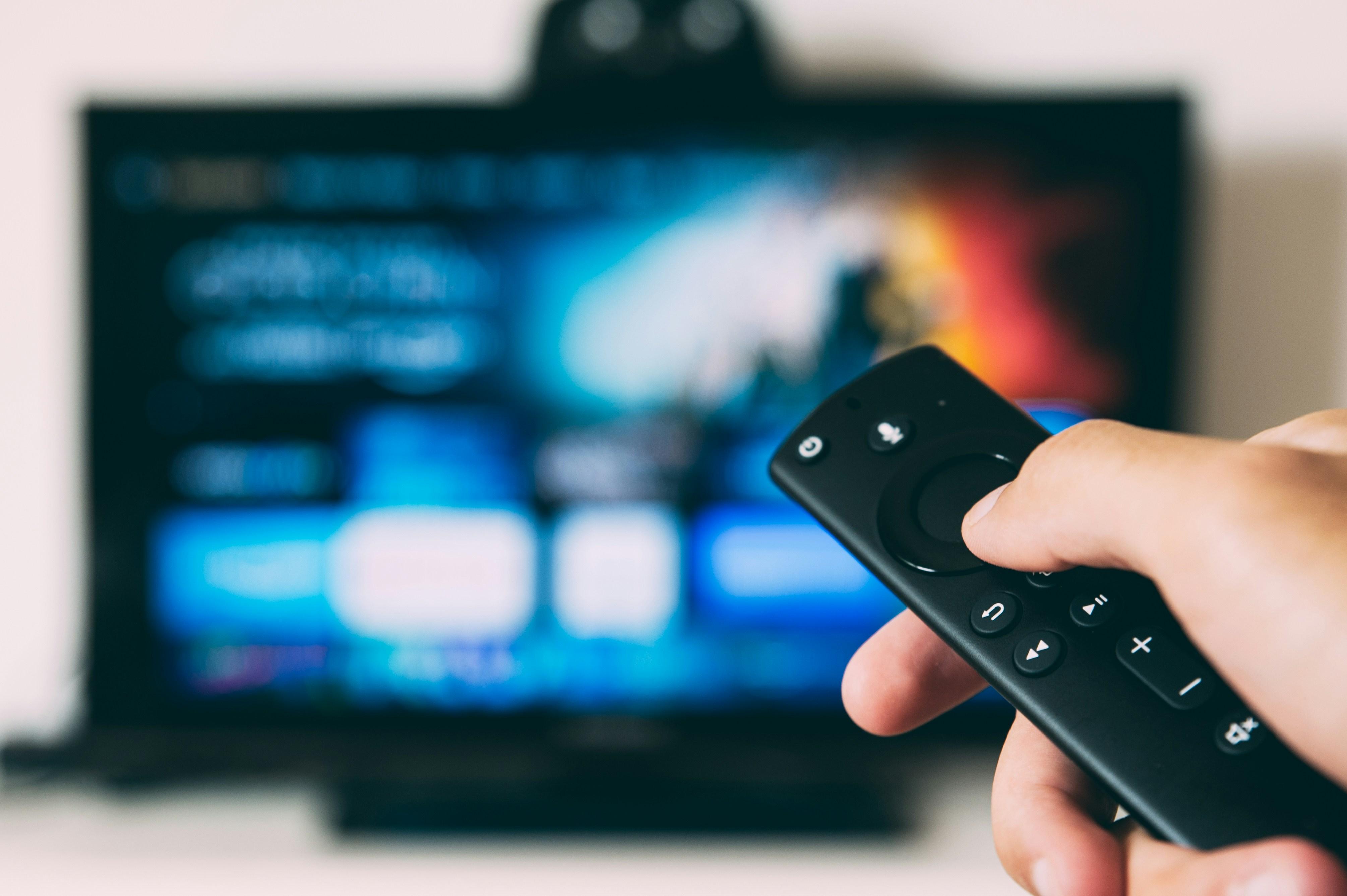 remote held up to a tv screen