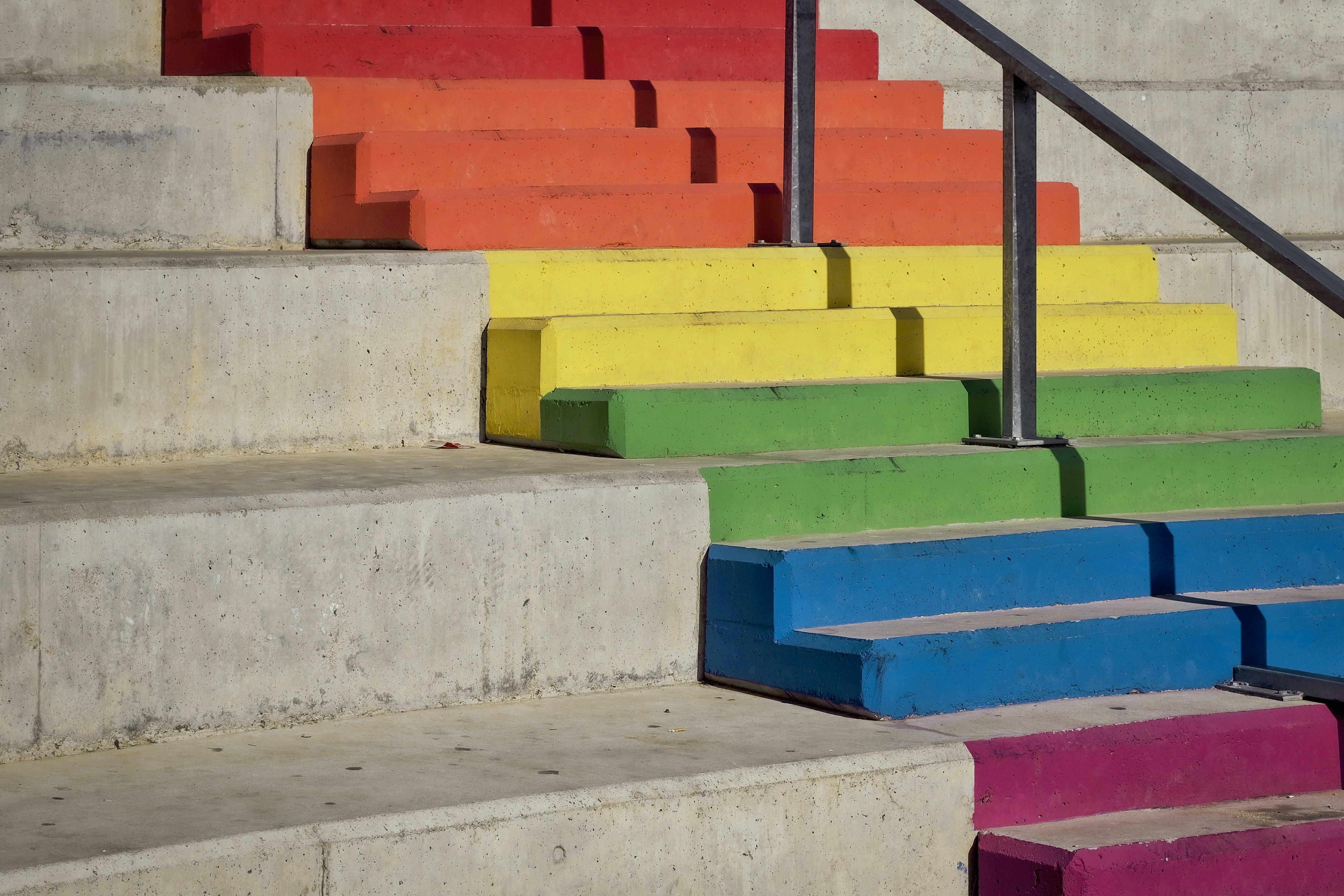 A set of steps in the pride flag colours.