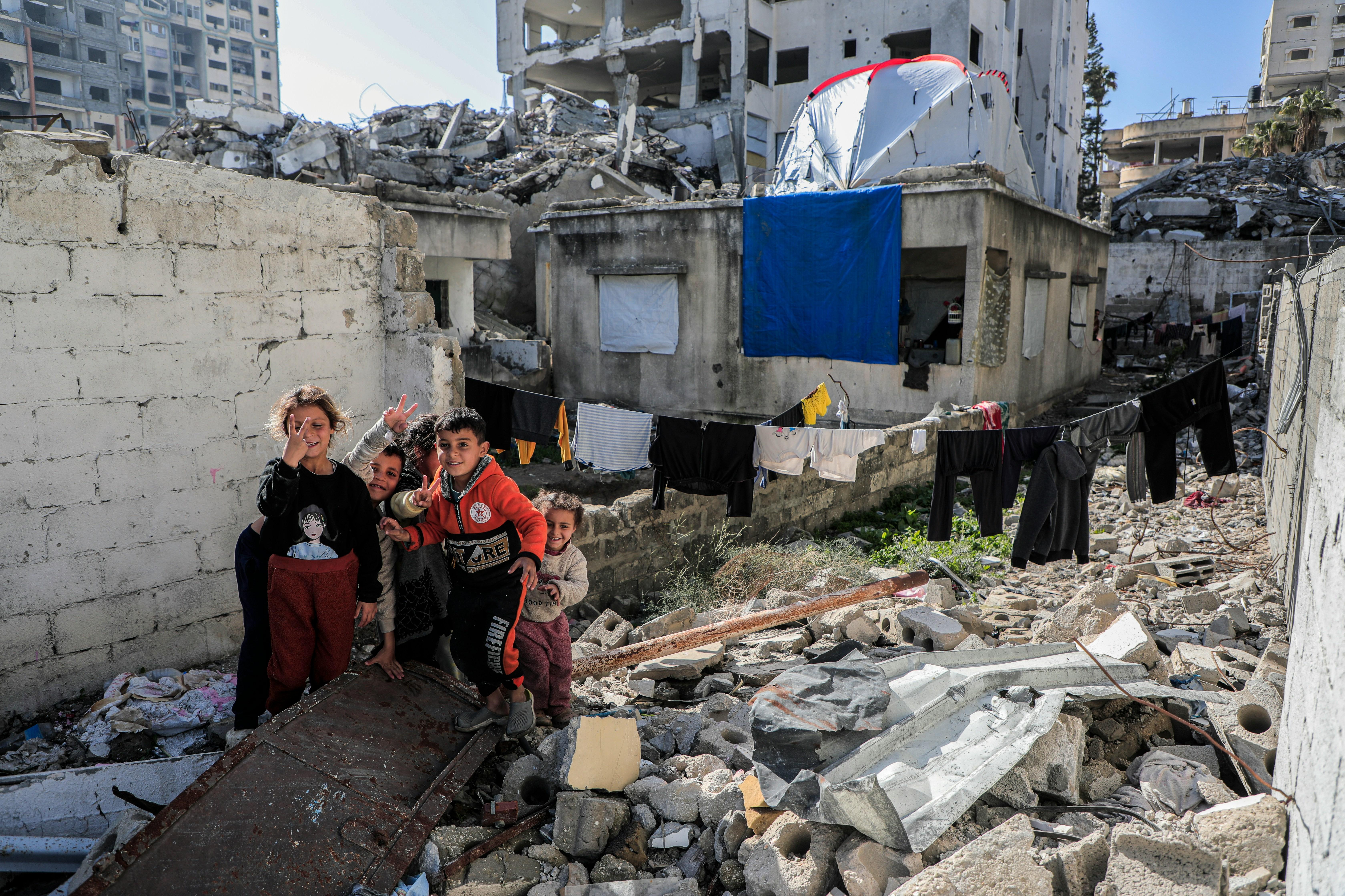 Children playing in the rubble of Palestine.