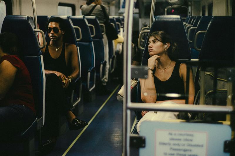 Two young people on the train.