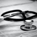 black and white photo of a stethoscope 