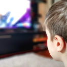 young boy watching tv