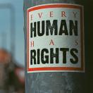 a picture of a flyer on a post that says "every human has rights"