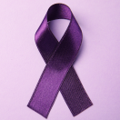 purple ribbon symbolizing domestic abuse awareness