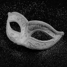 black and white image of a masquerade mask