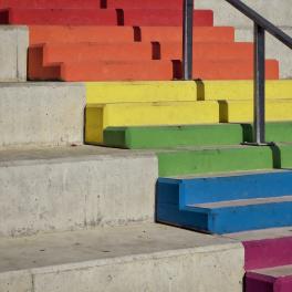 A set of steps in the pride flag colours.