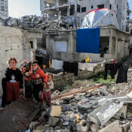 Children playing in the rubble of Palestine.