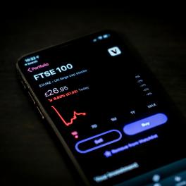 A phone screen showing stock market predictions. 