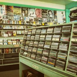 The interior of a CD and record store. 