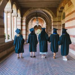 Five women graduating from college. 