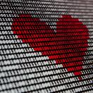 image of heart made out of binary code