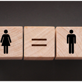Wooden blocks with man and woman symbols on them