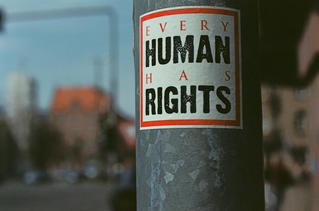 a picture of a flyer on a post that says "every human has rights"