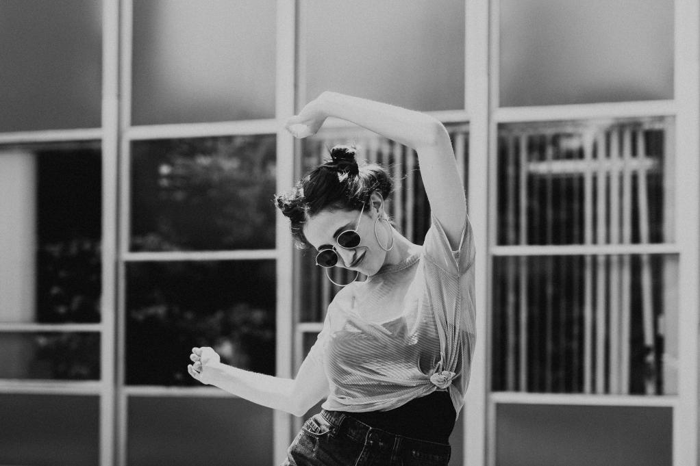 black and white photo of woman dancing