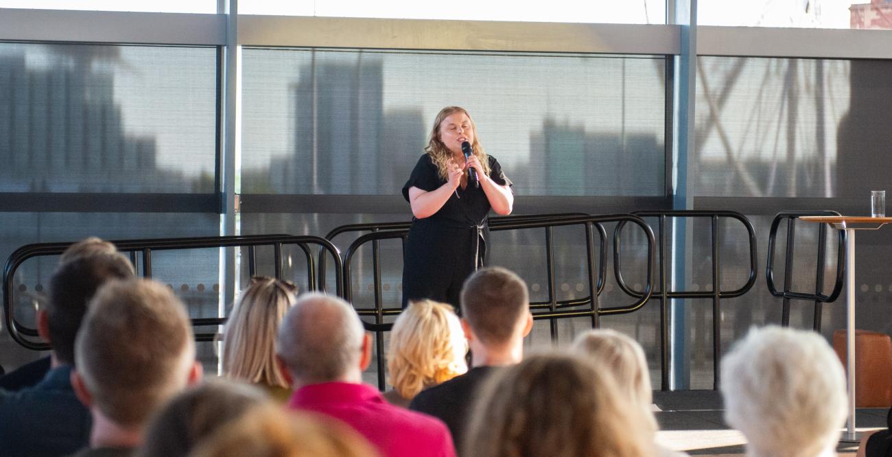 Molly doing a TEDx talk in the Senedd (Welsh Government)