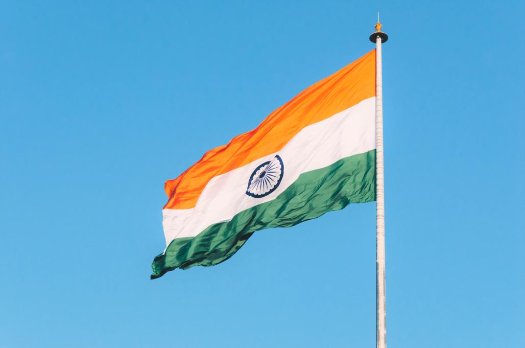 an Indian flag waving in the wind