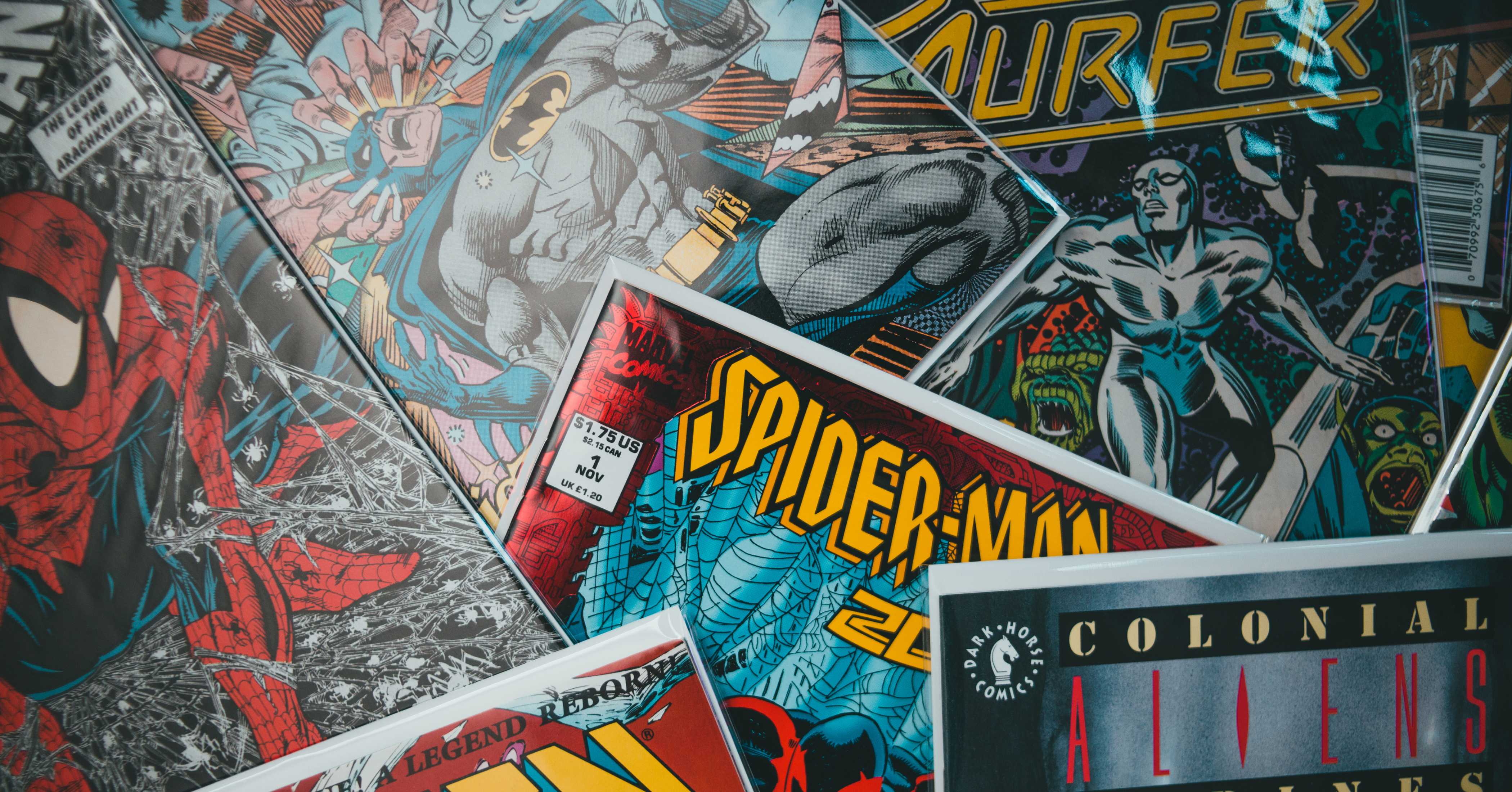 pile of various comic books